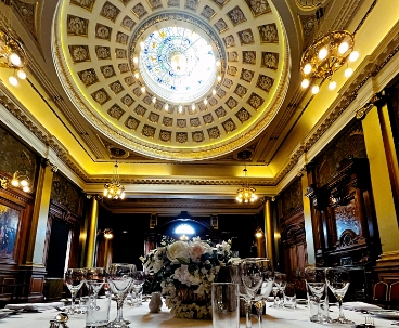 City Chambers ceiling with table set for dinner below